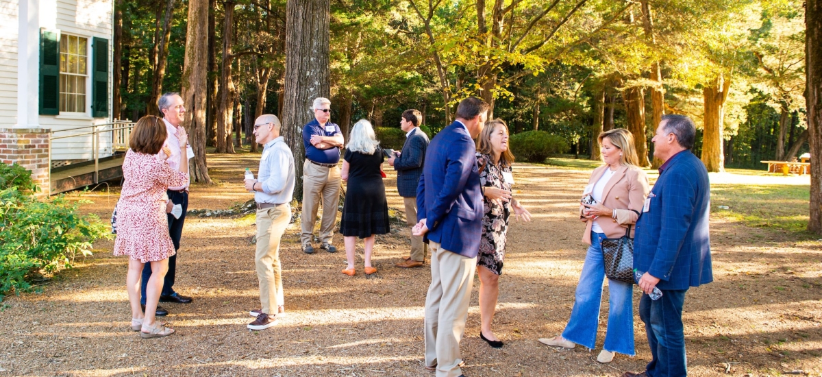 Members visit the grounds of Rowan Oak